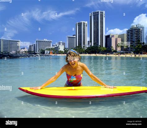 Waikiki beach woman surfer surfing hawaii hi-res stock photography and images - Alamy