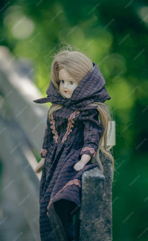 Premium Photo Amazing Realistic Vintage Porcelain Doll Toy With Brown