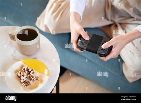 Woman Holding A Game Controller Stock Photo Alamy