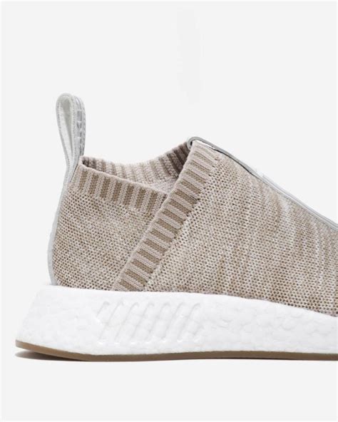 ᐅ KITH x NAKED x adidas Consortium NMD CS2 Sandstone SNKR