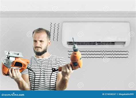 A Man In Disbelief Chooses A Tool For Repairing An Air Conditioner How