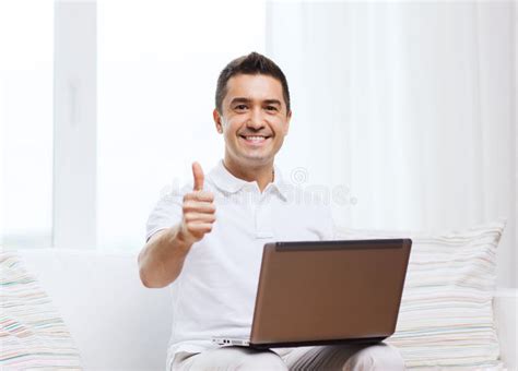 Happy Man Working With Laptop Computer At Home Stock Photo Image Of