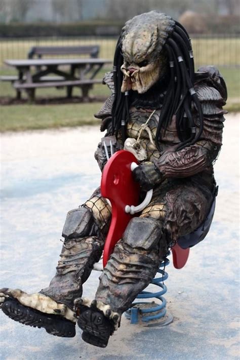 Wearing A Predator Costume In A Playground | Predator costume, Alien vs ...