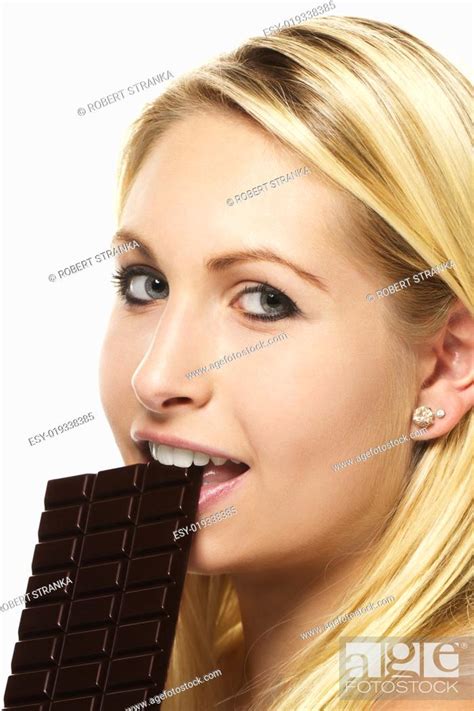 schöne blonde frau isst schokolade Stock Photo Picture And Low Budget Royalty Free Image Pic