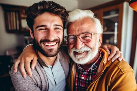 Premium Photo Father With His Adult Son Hugging