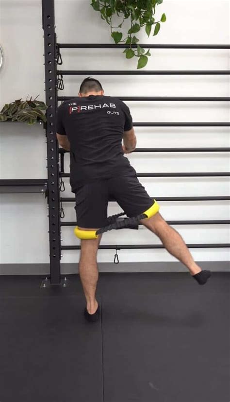 Standing Hip Abduction Band At Knees Wall Supported P Rehab