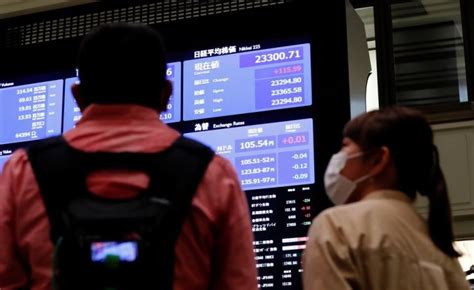 Asian Shares Mixed After Wall Street Logs More Gains