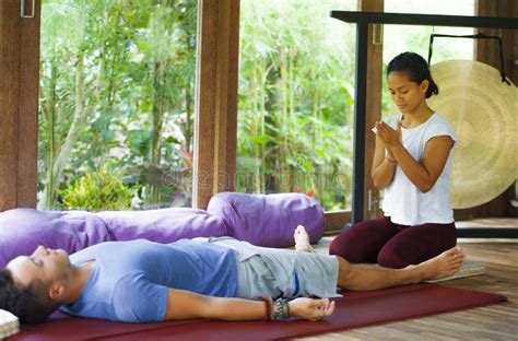 Young Beautiful And Exotic Asian Balinese Wellness Therapist Giving