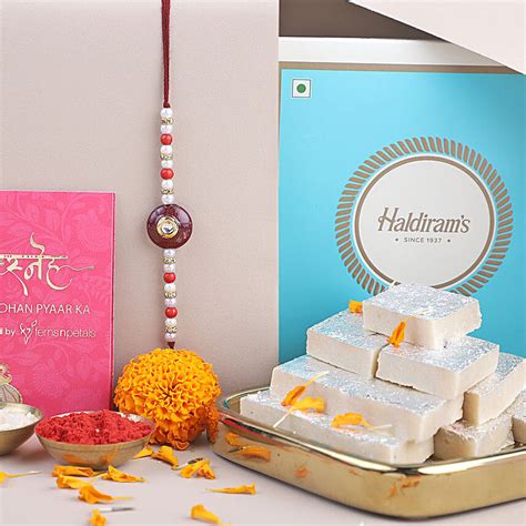 Buy Send Sneh Kundan Pearl Rakhi With Kaju Katli Online FNP