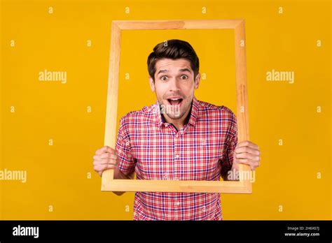 Photo Of Amazed Happy Shocked Young Man Hold Hands Frame Image Isolated