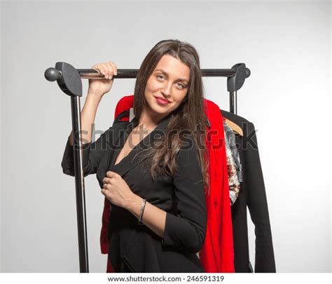 Smiling Shopping Brunette Looking Rail Clothes Stock Photo 246591319