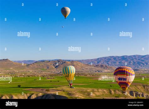 Colorful Hot Air Balloons Over Cappadocia A Semi Arid Region In Central