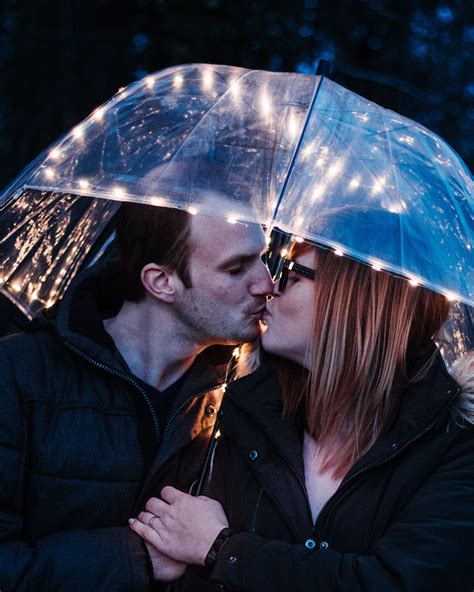 Cute Couple Kissing In The Rain Under An Umbrella Never Let It Be Said