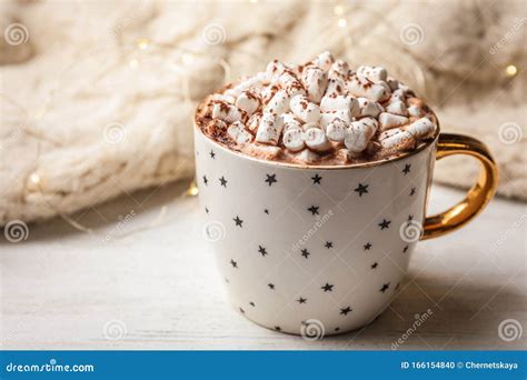 Cup of Delicious Hot Cocoa with Marshmallows on White Wooden Table ...