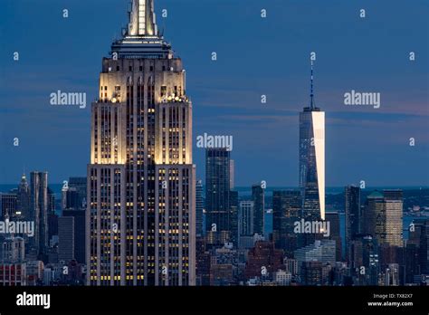 The Empire State Building And One World Trade Center At Night New York