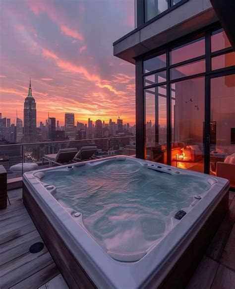 Modern Penthouse Apartment Jacuzzi On Terrace Balcony With City Skyline