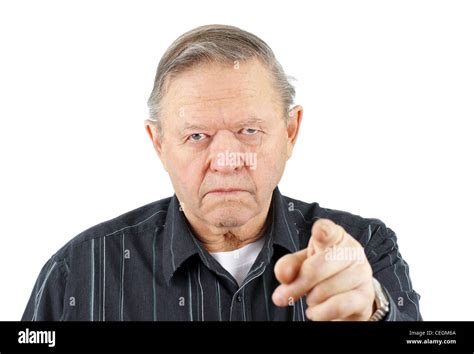 Grumpy Angry Senior Or Old Man Pointing His Finger At The Camera With A