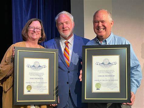 Chuck And Gail Nicholas Awarded Order Of The Silver Crescent The