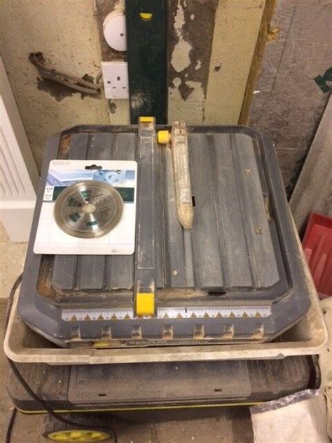 Titan Electric tile cutter + spare disc | in Bearsden, Glasgow | Gumtree