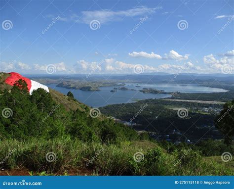 A Huge Indonesian Flag On The Hill Ridge At Sentani Lake Area Stock