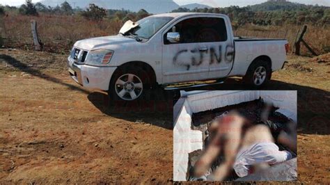 Abandonan dos cuerpos en camioneta con siglas del CJNG en Michoacán