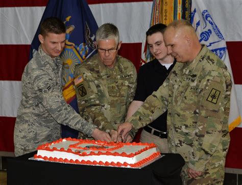 New York's oldest and youngest National Guard members mark Guard birthday with cake cutting ...