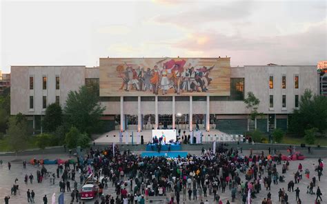 The Restoration Of The Albania Mosaic On The Facade Of The National