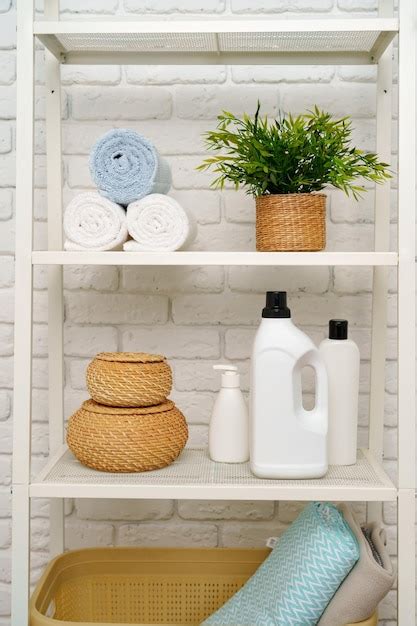 Premium Photo Rolled Fluffy Towels On Shelf In Bathroom