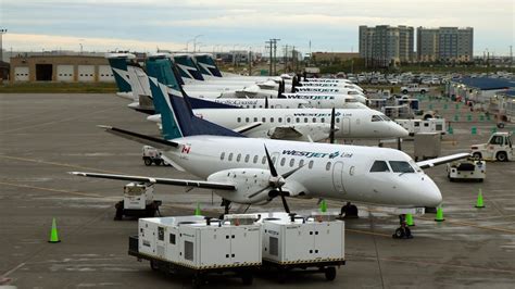 2 Calgary Flight Passengers Got Slapped With 1 000 Fines For Refusing