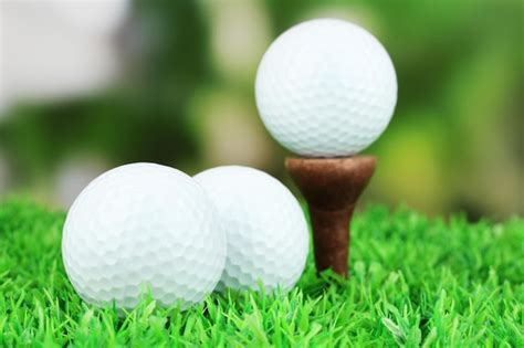 Premium Photo Golf Balls On Grass Outdoor Close Up