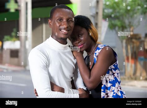 Young Romantic Person Couple Laughing Standing In Town Young Smiling