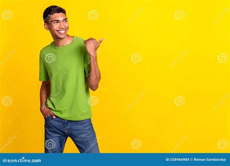 Closeup Photo Of Young Hansome Smiling Positive Guy Wear Green T Shirt Look Directing Finger