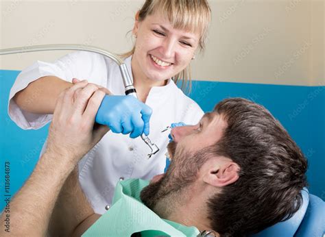 Doctor Examines The Oral Cavity On Tooth Decay Caries Protection