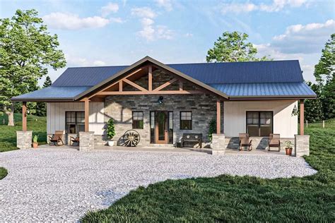 Rustic Ranch Home Plan With Cathedral Ceilings And A Broad Front Porch