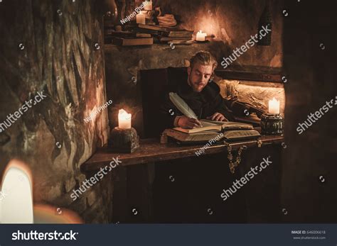Стоковая фотография 646006618: Монах летописец пишет древнюю рукопись ...