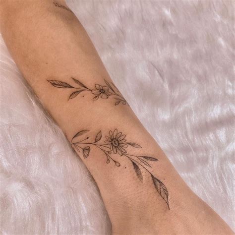 Arm Wrap Tattoo Wrap Around Wrist Tattoos Wrap Around Tattoo Flower