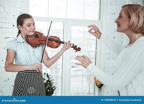 Nice Talented Girl Showing Her Music Skills Stock Image Image Of