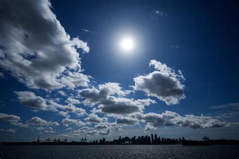 Cloud Breaks Bring Cheers From Partial Solar Eclipse Watchers At Bc