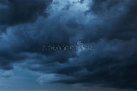 Dark Sky with Rain Clouds Over the Sea Stock Photo - Image of dramatic ...