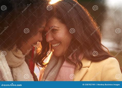 Loving Same Sex Female Couple Outdoors On Walk In Autumn Countryside Together Stock Image