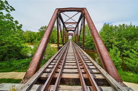 Train Tracks On Iron Truss Railroad Bridge Over Kokosing River With