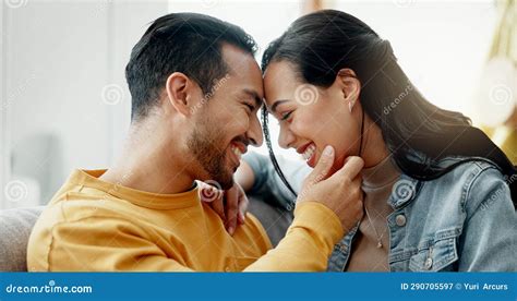 Couple Forehead Touch And Relax On Sofa With Love Bonding And Happy