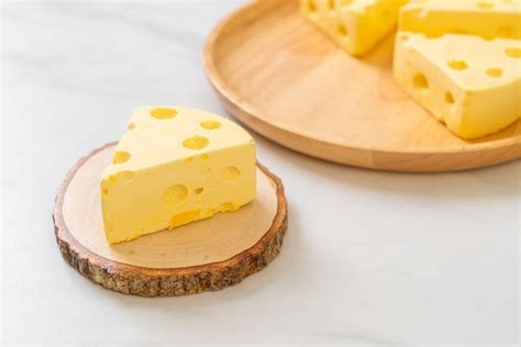 Premium Photo Cheesecake Pieces With Shape Of Cheese