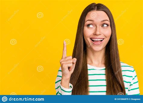 Photo Of Nice Funky Lady Dressed Striped Shirt Pointing Finger Empty Space Isolated Yellow Color