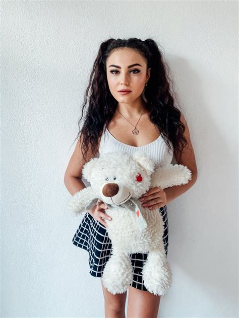Beautiful Brunette Woman Holds A Toy Bear Stock Image Image Of Girl Bedroom