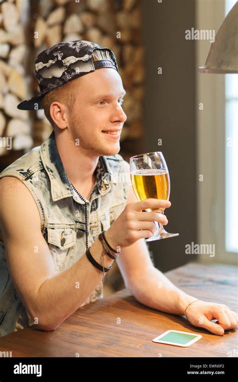 Happy Man Drinking Beer At Bar Or Pub Stock Photo Alamy