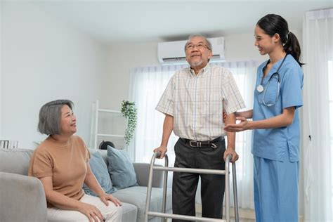 Premium Photo Asian Woman Caregiver Doctor During Home Visit Helping