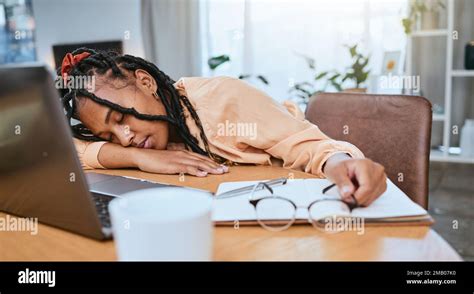 Black Woman Sleeping And Studying In Home Office With A Book While