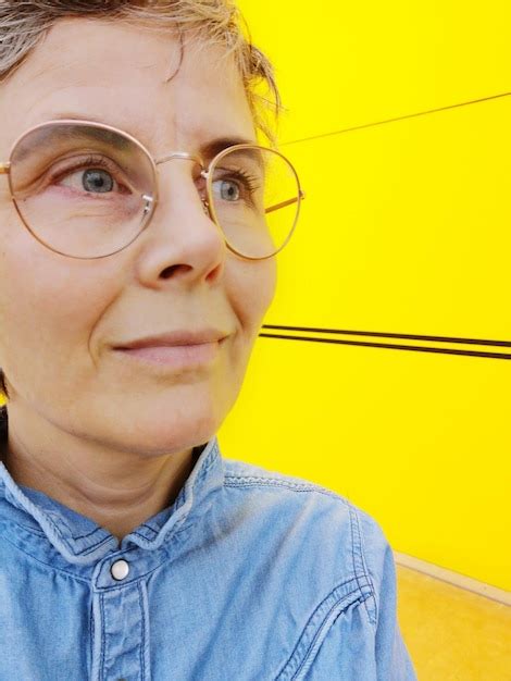 Premium Photo Close Up Of Thoughtful Mature Woman Looking Away While