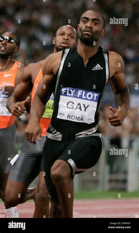 Tyson Gay Of United States Foreground Wins The Men S Meters Ahead Of Asafa Powell Of
